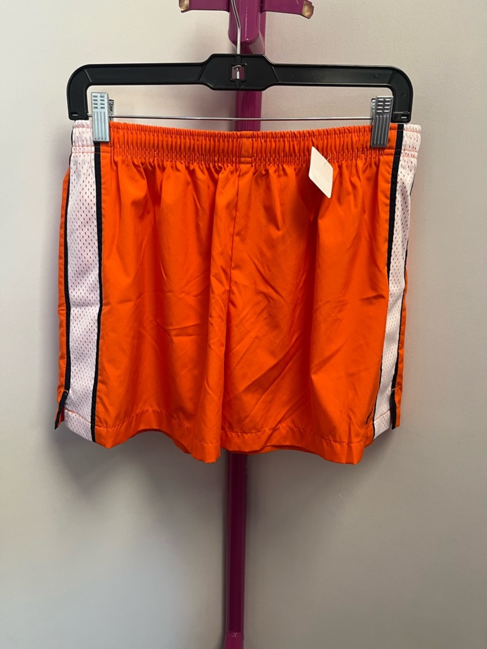 Nike Orange Athletic Shorts with White Mesh Sides and Black Trim